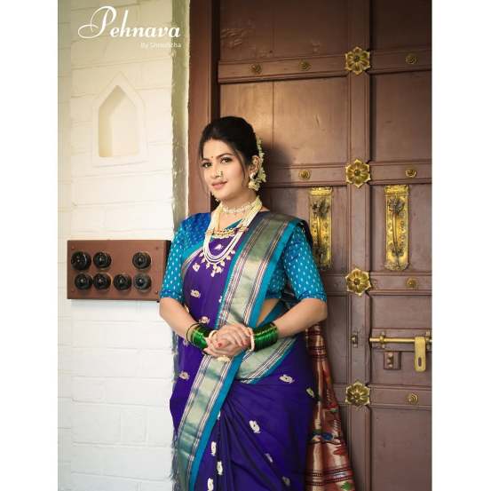 Dhanashri Kadgaonkar shares pictures in violet paithani saree on social media on the occasion of Shivaji Jayanti