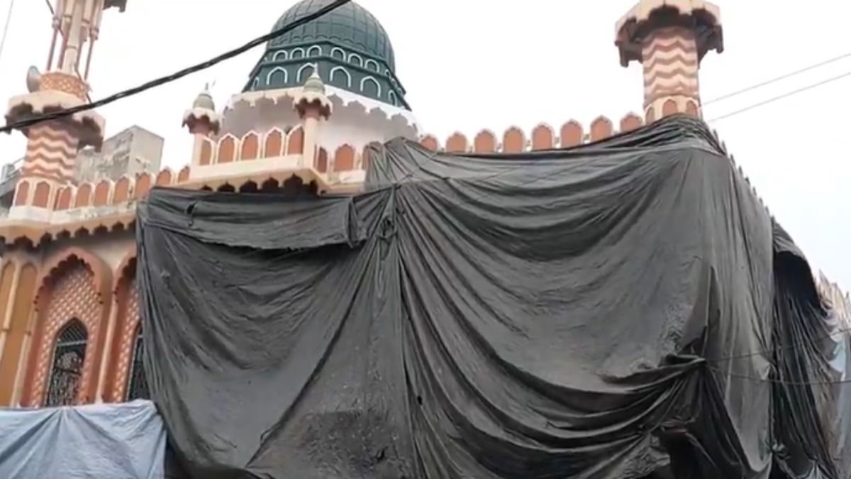 Mosques in Aligarh covered with tarpaulins for Holi celebrations as police ensure security.