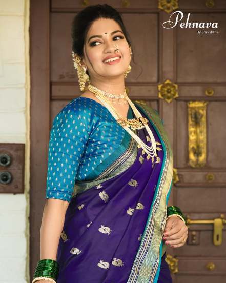 Dhanashri Kadgaonkar Red Banarasi Saree Look