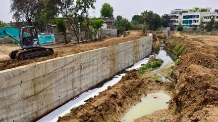 District Collector sought report from District Soil and Water Conservation and  Metropolitan Municipal regarding the construction wall in the drain Chandrapur