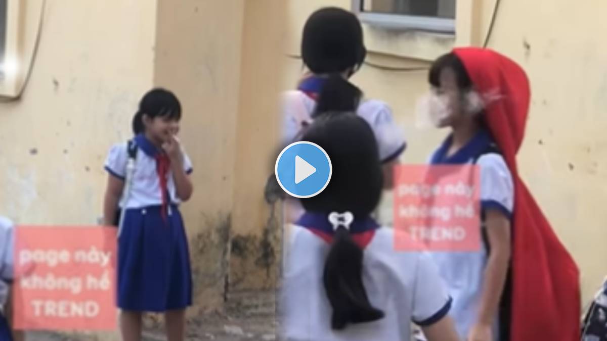 School girls smoking in school area