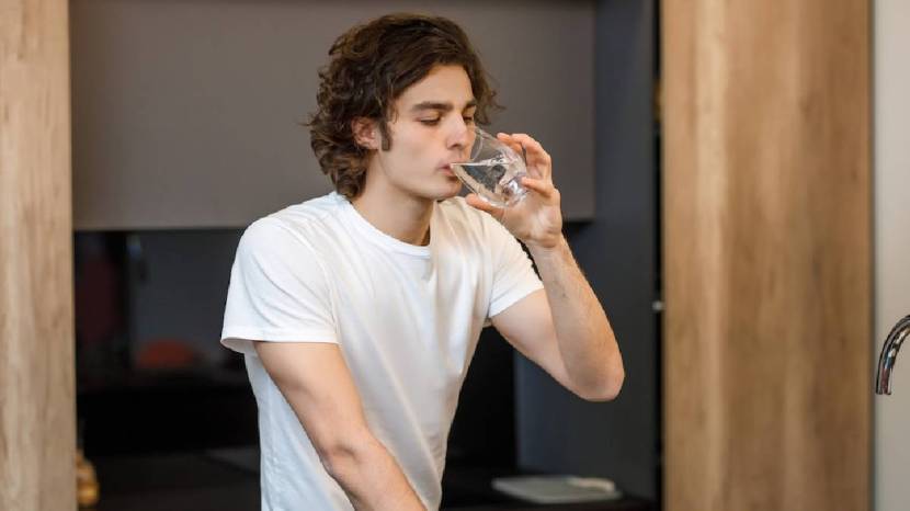Why is it important to drink enough water during summer