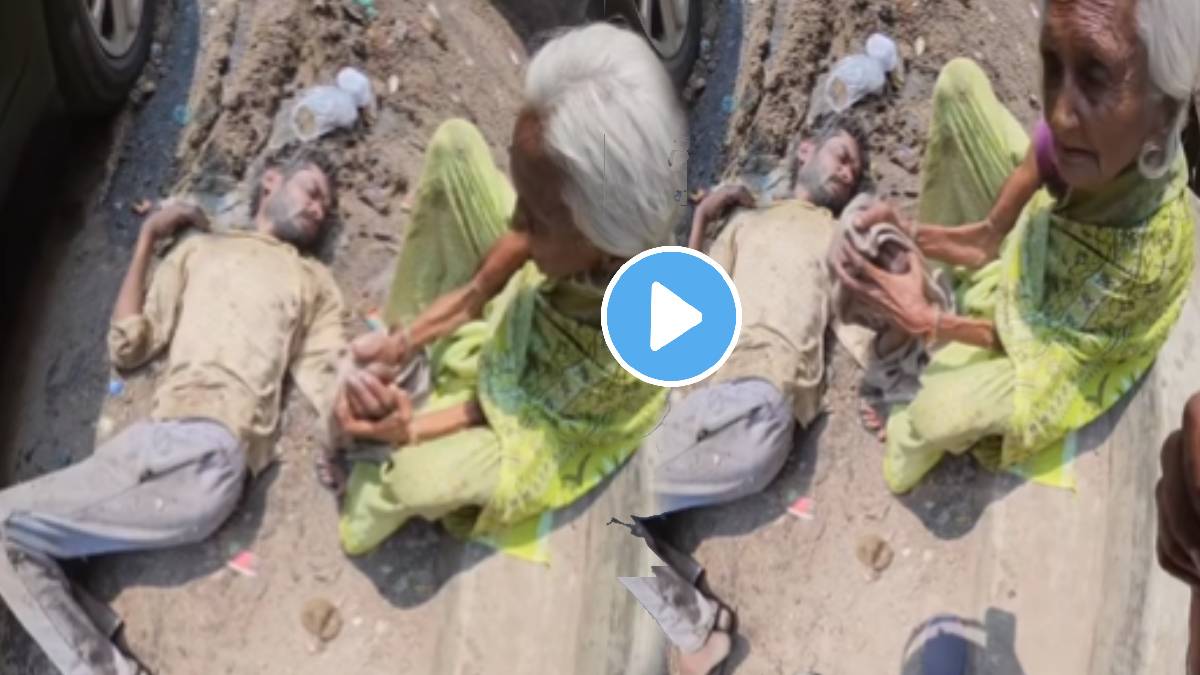 Mother trying to hold his alcoholic son on road emotional video goes viral on social media