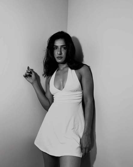 neha khan bold in sleeveless white dress
