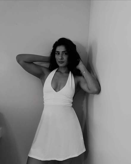 neha khan bold in sleeveless white dress