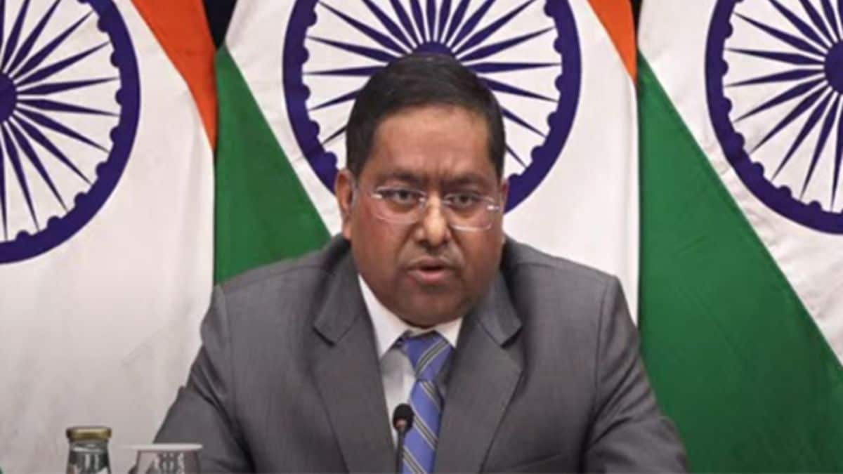 Indian official holding a Ministry of External Affairs document on long-term visas for Hindu Pakistani nationals
