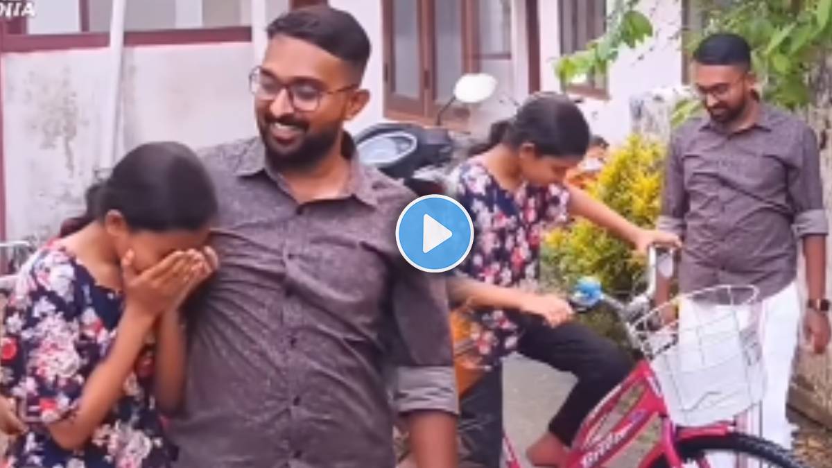 video shows father gift his daughter cycle
