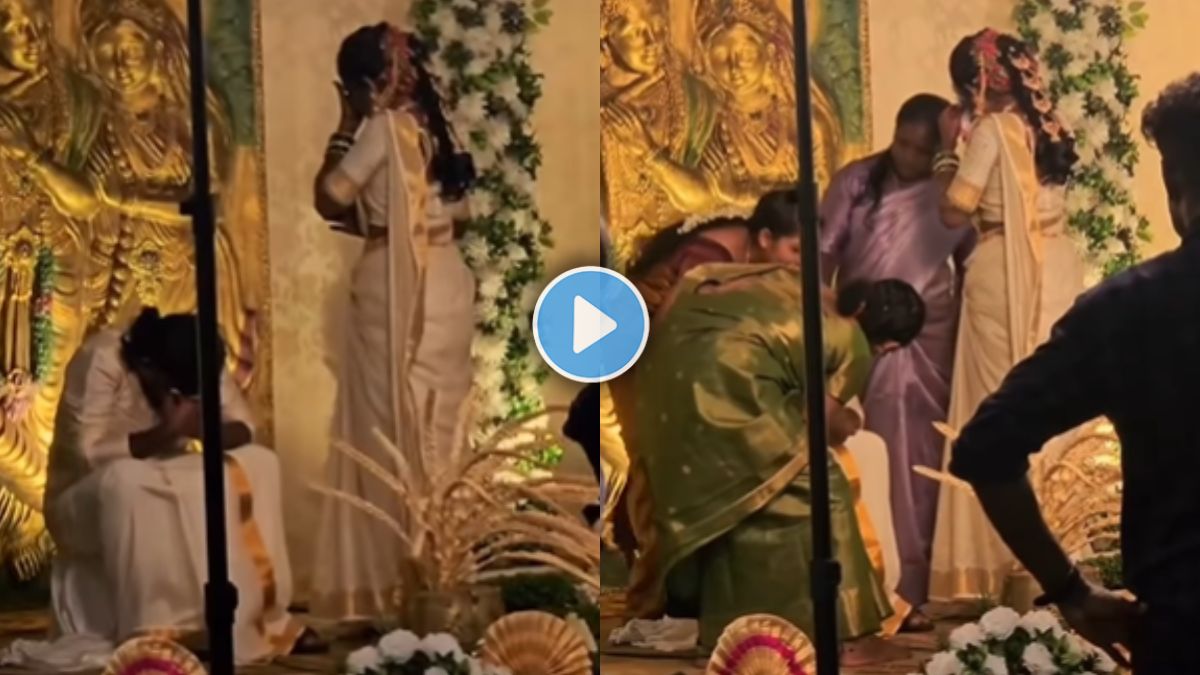 Bride and groom crying emotionally during wedding ceremony