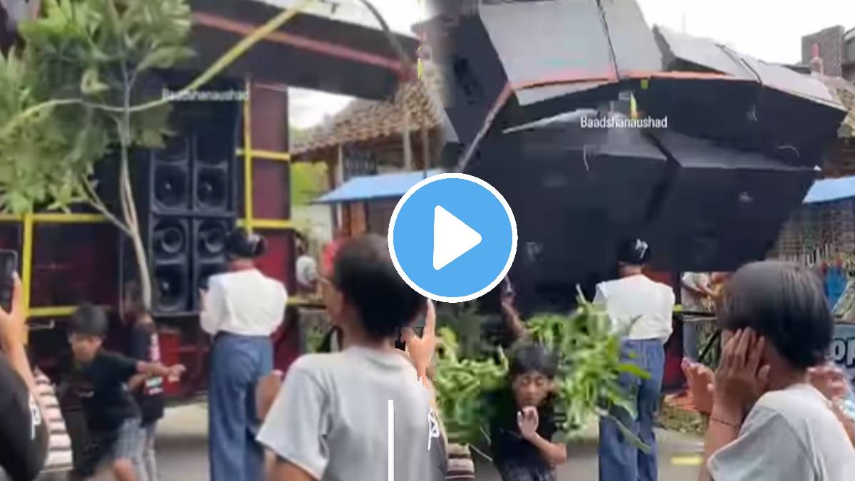DJ's huge setup falls on young woman's head while she's dancing on road shocking video goes viral on social media