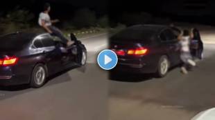 young man doing car stunt