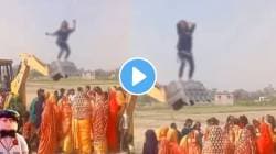 अख्खं गाव जमलं तरी ती थांबली नाही; तरुणीनं जेसीबीवर उभं राहून काय केलं पाहा, VIDEO तुफान व्हायरल