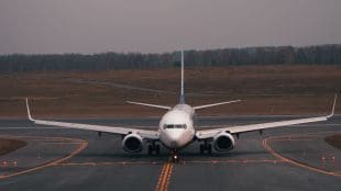 Security personnel inspecting Chennai-Colombo flight at Sri Lankan airport