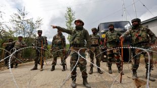 BSF soldiers detain Pakistani army personnel at Rajasthan border.