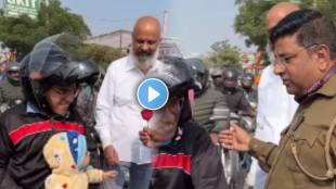 Police Offer talk about traffic rules with two little girls