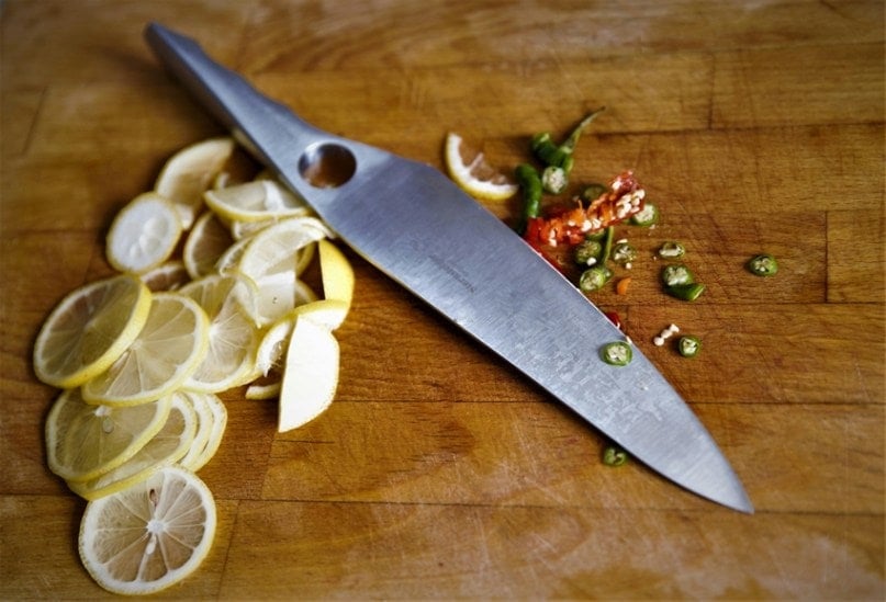 Why do Indians hang lemon chilli on their doors?