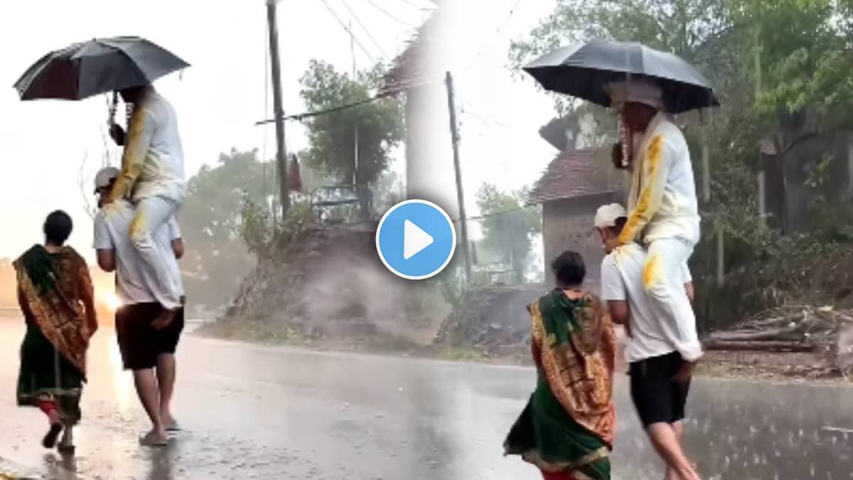 man Carries groom on his shoulder