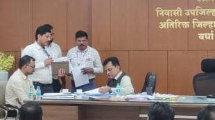 somaiya at depputy collector's desk in Wardha