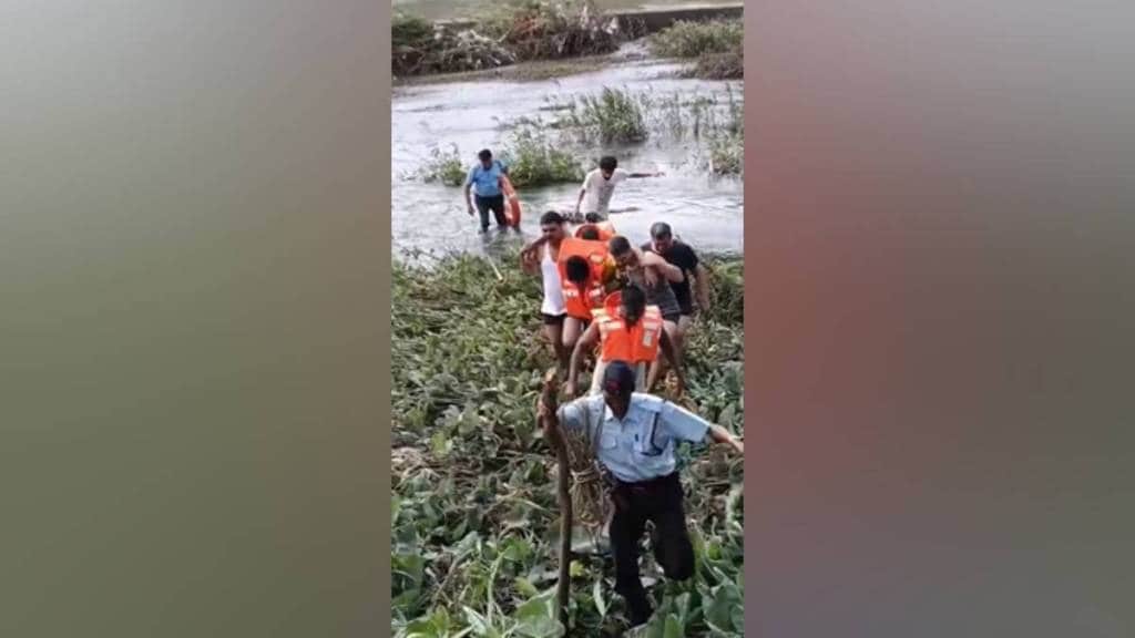 Life saved college youth , youth stuck in riverbed,