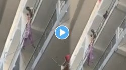 “एवढी क्रूरता येतेच कुठून?” रागाच्या भरात पती बनला राक्षस; पत्नीला उंच इमारतीच्या रेलिंगवरून लटकवले अन्…; VIDEO व्हायरल