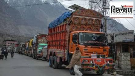 Stranded trucks stand along the Karakoram Highway, blocked by residents during a sit-in protest against power outages in Khaplu city, in Pakistan-occupied Gilgit-Baltistan region,