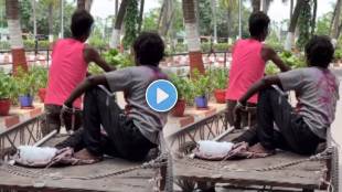 guy carrying his Fractured friend on handcart